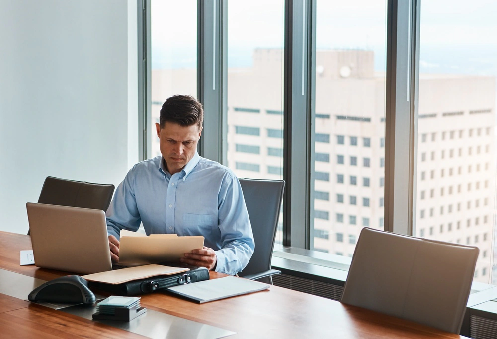 Image of a lawyer reviewing documents.