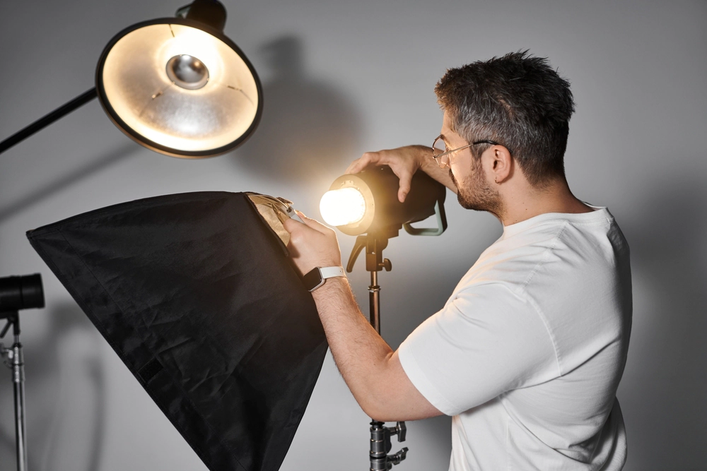 Photographer setting up equipment.